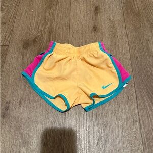 Nike Yellow Shorts with Pink and Teal Trim